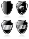 Set of four black steel shields