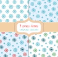 Set of four Christmas seamless vector patterns with snowflakes. Royalty Free Stock Photo