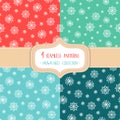 Set of four Christmas seamless vector patterns with snowflakes. Royalty Free Stock Photo