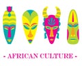 Set of four color traditional African masks on a white background. Royalty Free Stock Photo