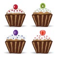 Set of four cupcakes with fruit