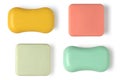 A set of four different bars of soap. Full depth of field.