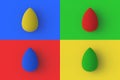 Set of four different color cosmetic sponge on colorful segmental background.