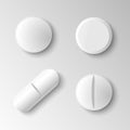 Set of four different vector realistic white pills isolated on g Royalty Free Stock Photo