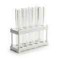 A set of four empty glass test tubes in a white rack on a white background Royalty Free Stock Photo