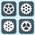 Set of four flat gear icons with long shadows on a graph paper background. Royalty Free Stock Photo