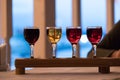 Set of four glasses with drinks of different colors Royalty Free Stock Photo