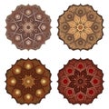Set with four Mandalas in chocolate colors. Vector ornaments, round decorative elements for your design Royalty Free Stock Photo