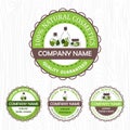 set of four natural cosmetics labels on wooden background