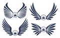 Set of four pairs of wings with crowns. Vector illustration.