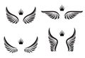 Set of four pairs of wings with crowns. Vector illustration