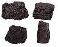 Set of four piece of coal isolated on a white Royalty Free Stock Photo