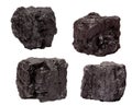 Set of four piece of coal isolated on a white Royalty Free Stock Photo