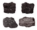 Set of four piece of coal isolated on a white Royalty Free Stock Photo