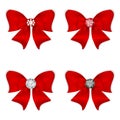 Set of four red bows for decoration.