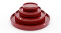 A set of four red ceramic plates stacked on top of each other Royalty Free Stock Photo