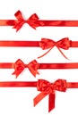 Set of four red ribbon satin bows Royalty Free Stock Photo