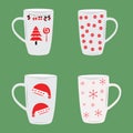 Set of four Red and white Christmas coffee mugs Royalty Free Stock Photo