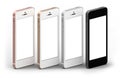 Set of four smartphones gold, rose, silver and black with blank screen. Royalty Free Stock Photo