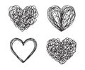 Set of four tangled grungy heart scribbles Royalty Free Stock Photo