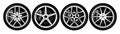 A set of four wheels with different rims. Template for design. Monochrome vector illustration