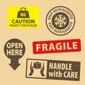 Set of fragile sticker handle with care and case icon packaging symbols sign, keep refrigerated, open here rubber stamp on cardboa Royalty Free Stock Photo