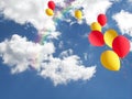 yellow and red balloons with rainbow