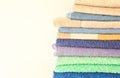 Set of fresh bath towels in bright colors. Soft towels for kitchen and bathroom with text space Royalty Free Stock Photo