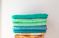 Set of fresh bath towels in bright colors. Soft towels for kitchen and bathroom with text space Royalty Free Stock Photo