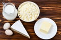 Set of fresh dairy products on wooden background. Royalty Free Stock Photo