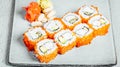 Set of fresh delicious California sushi rolls served on a white plate Royalty Free Stock Photo