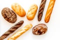 Set of fresh homemade bread. Bread assortment. Loaf, baguette. White and brown bread on white background top view Royalty Free Stock Photo