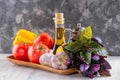 Set of fresh raw vegetables. Tomato, bell pepper, garlic, basil and lemon on a wooden tray. Healthy eating. Organic Royalty Free Stock Photo