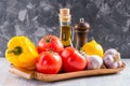 Set of fresh raw vegetables. Tomato, bell pepper, garlic and lemon on a wooden tray. Healthy eating. Organic food Royalty Free Stock Photo