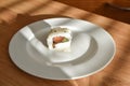 A set of fresh sushi roll with salmon, avocado and black sesame seeds served on a white plate Royalty Free Stock Photo