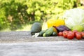 Set of fresh vegetables and fruits on rustic wooden table and bl Royalty Free Stock Photo