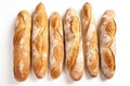 Set of freshly baked homemade French baguettes on white background. Generated by artificial intelligence