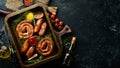 Set of fried barbecue sausages with rosemary and sauces. Royalty Free Stock Photo