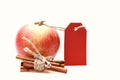 Set of fruit, cinnamon sticks and empty red price tag. Royalty Free Stock Photo