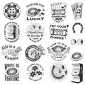 Set of gambling vintage print, logo, badge design with wheel of fortune, two dice, skeleton hand holding dollar, poker Royalty Free Stock Photo