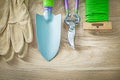 Set of gardening gloves hand spade garden tie wire pruning shear