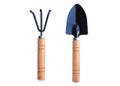 Set of gardening, a small hand rake, a hoe, and a shovel with a wooden handle on white background. Royalty Free Stock Photo