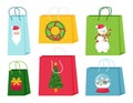 A set of gift or shopping bags with Christmas elements. Cute illustrations with characters and symbols of Christmas. Isolated Royalty Free Stock Photo