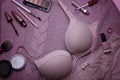 Set of glamorous stylish dusty pink sexy lingerie with woman accessories and cosmetics.