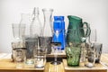 Set of glass glasses, cups, jugs and bottles