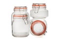 A set of glass jars with tight-fitting lids for bulk products on a white background.