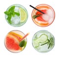 Set of glasses with different refreshing drinks on white background