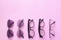 Set glasses or sunglasses object fashion minimal modern style, accessory travel on Pink pastel color background. Royalty Free Stock Photo