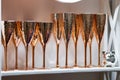 A set of glasses for wine and champagne, gold glasses made of copper with an interesting texture, bronze wine glasses of modern