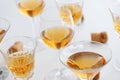 Set of glasses of yellow wine at wine tasting on white wooden table Royalty Free Stock Photo